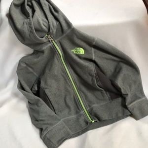 The North Face gray hoodie with neon green zipper.